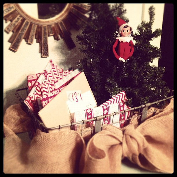 Day 1: Scout just showed up and brought a basket full of Christmas books. #thedailyscout #elfontheshelf #scenesfromtherockhouse