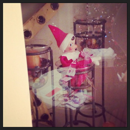 Day 14: Trapped behind glass... how'd that happen? #thedailyscout #elfontheshelf #scenesfromtherockhouse