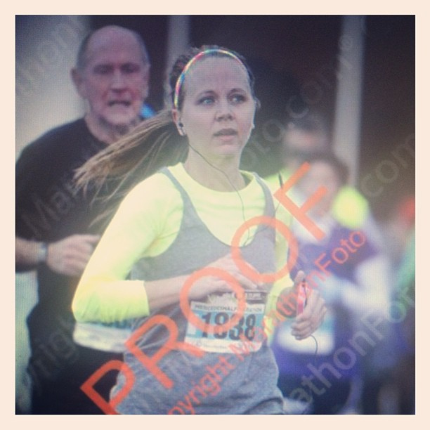 This is my "trying not to cry as I cross the finish line" face. Race photos are terrible!