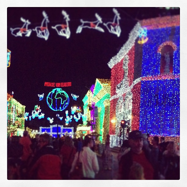 The girls are LOVING the dancing Christmas lights. #waltdisneyworld #hollywoodstudios