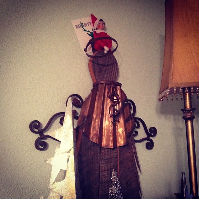 Not the greatest of photos, but today Scout was high atop our junk angel! #ntdadvent #elfontheshelf #thedailyscout13
