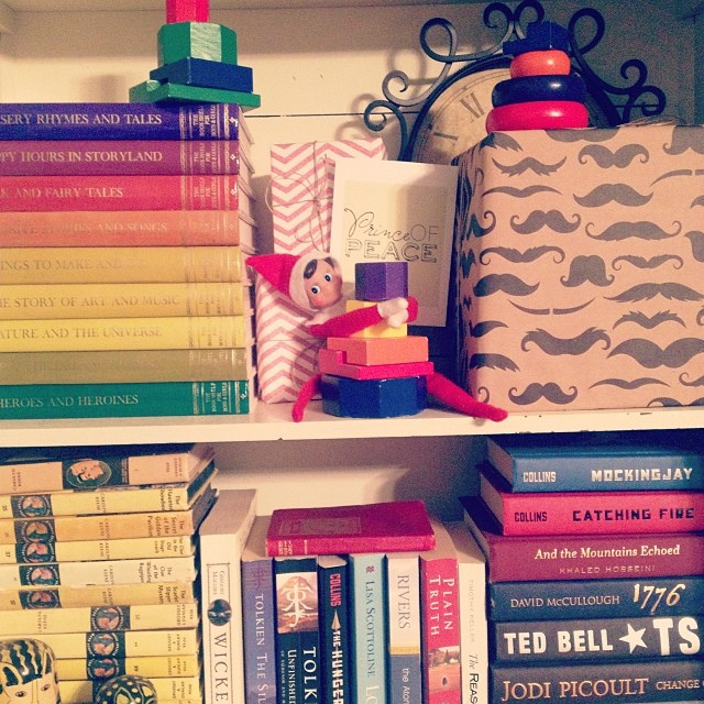 Day 5 of #thedailyscout13: building towers in the bookcase. #ntdadvent #elfontheshelf