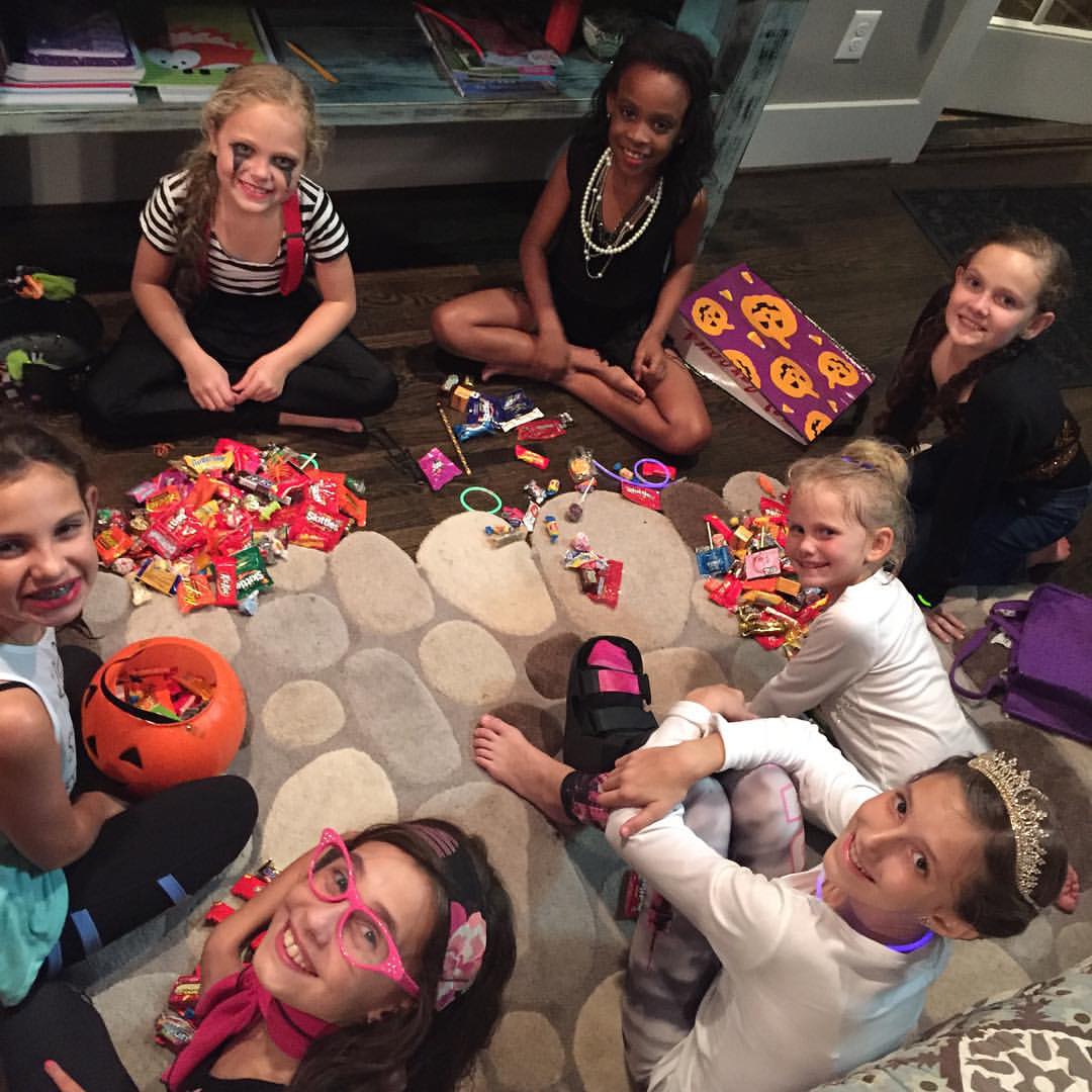 The BEST part of Halloween?! Trading candy with your girls.